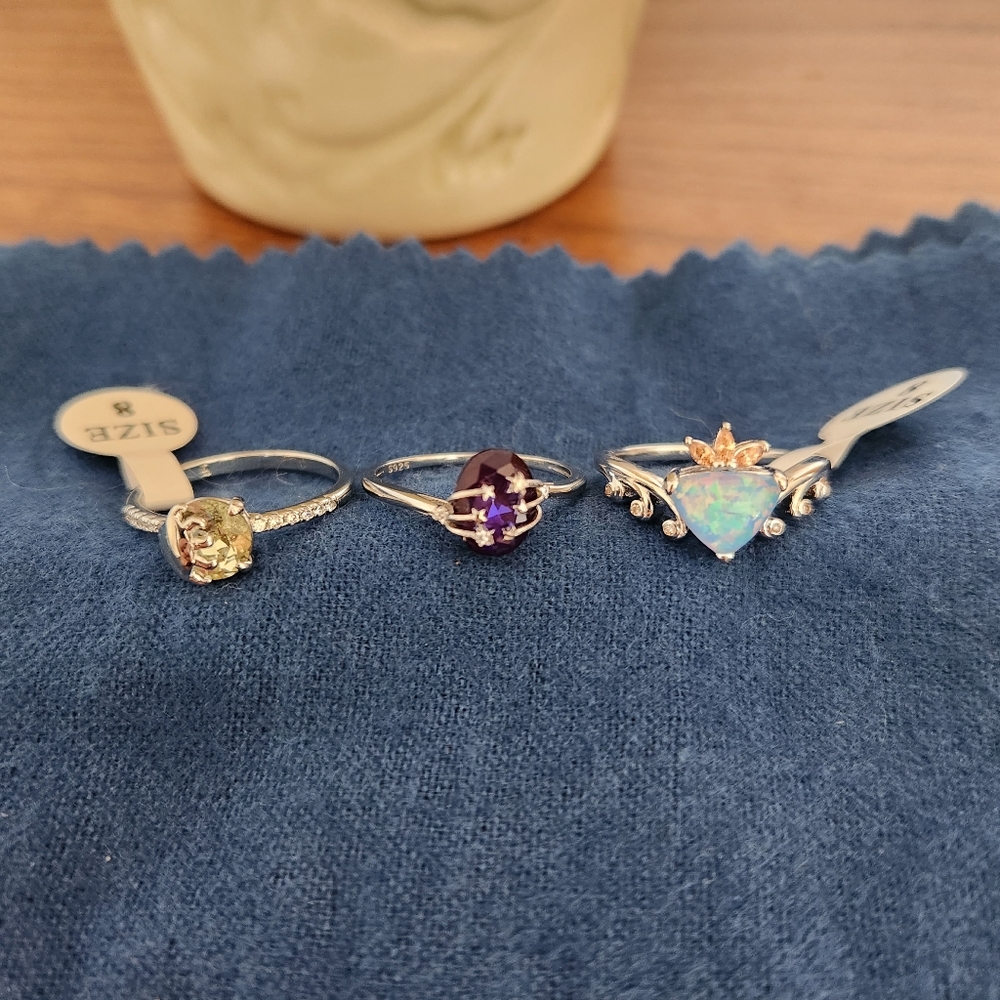 Three size 8 rings! Lemon, purple, and opal stones